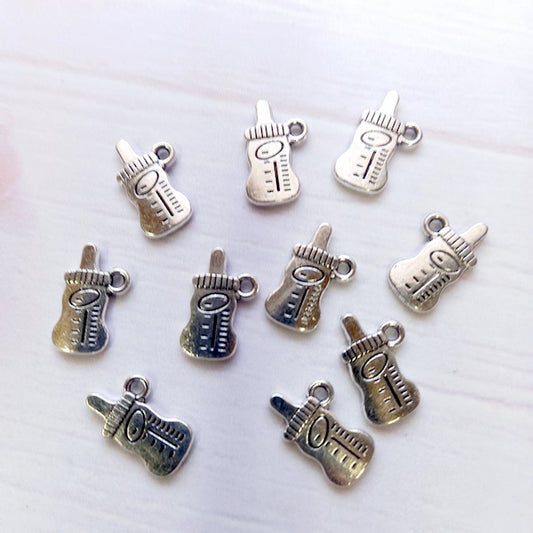 Dije metálico mamadera #19 (10un)