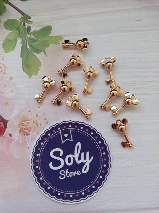 Dije metálico - llave mickey dorada #29