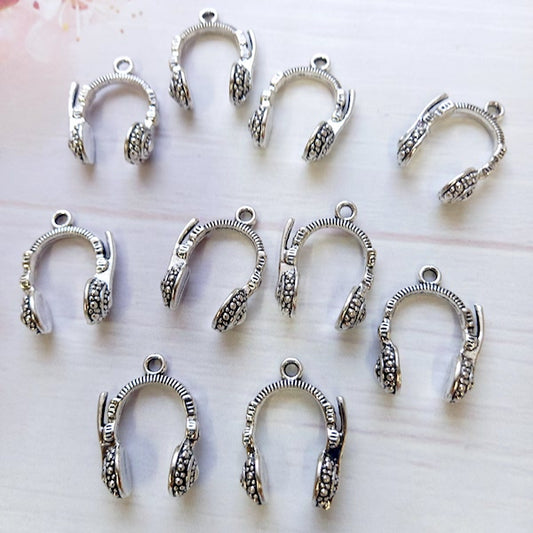 Dije metálico Audífono #34 (10un)