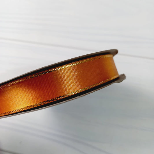 CINTA SATIN CON BORDE DORADO 50 MT - AMARILLO OSCURO