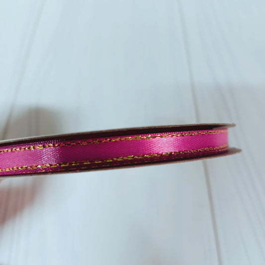 CINTA SATIN CON BORDE DORADO 7mm 50 MT - FUCSIA