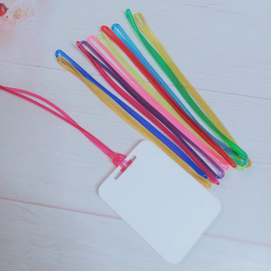 Pack 10 amarras plásticas para tag mix colores + Acrílico BLANCO 6x8cm