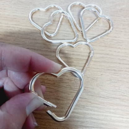 Mosquetón corazón Dorado 5un